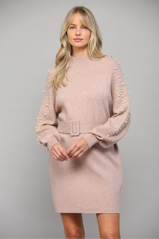 pink sweater dress with pearls