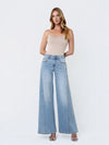 Mid Rise Light Wash Twisted Seam Palazzo Jeans