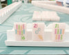 Pink Coastal Signature Engraved Tile Set by Amahj Line