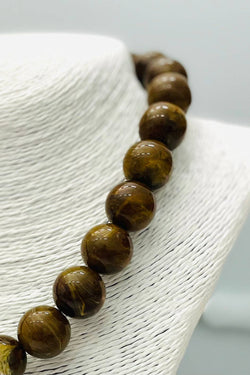 Quatrefoil Pendant on Beaded Necklace